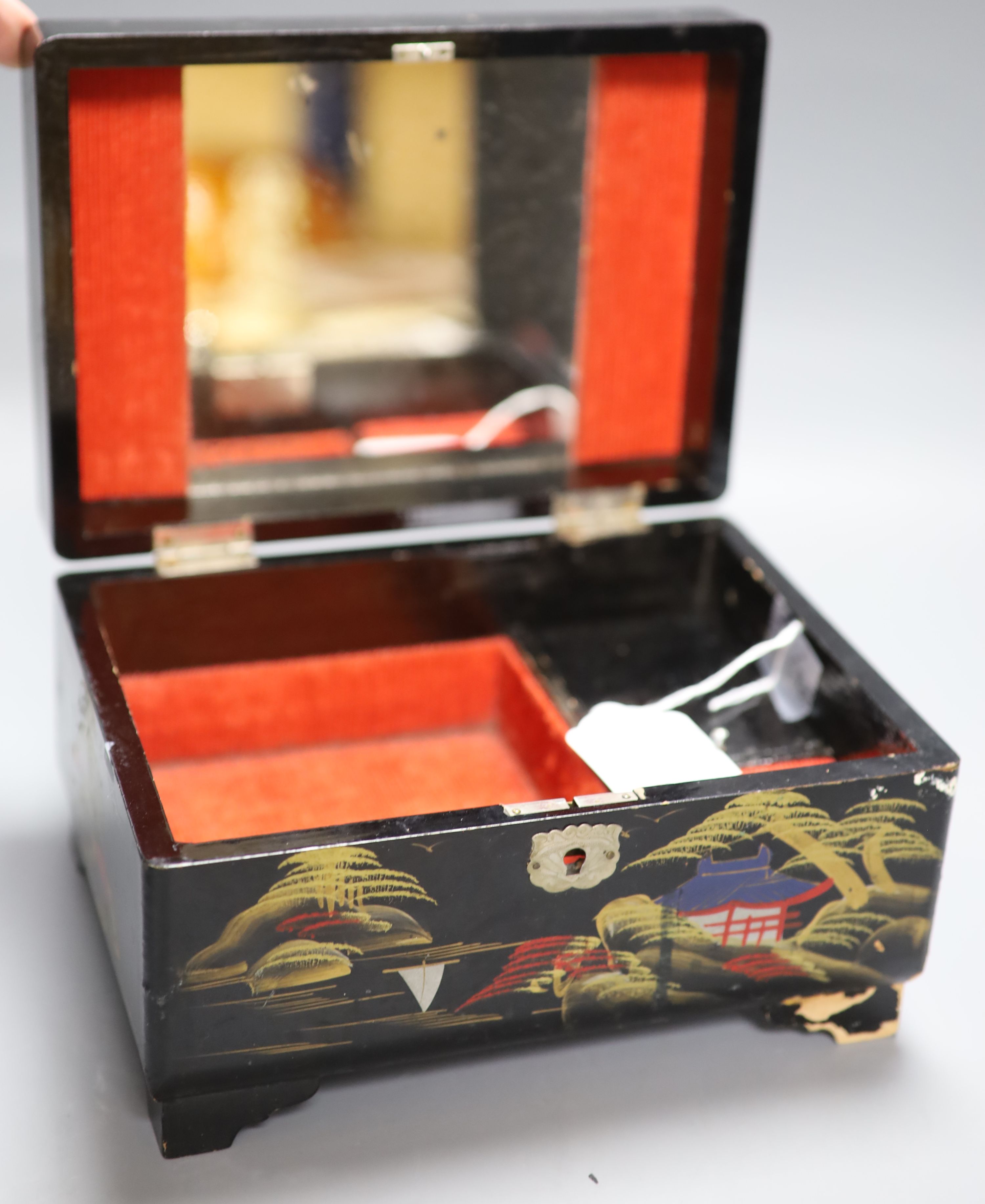 A pair of Chinese turquoise-glazed lion dogs, a lacquered jewellery box and three plated miniature figures